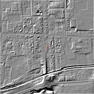 Shaded relief map of the ground around M168NX, computed from Environment Agency LiDAR. The ground here sits at about 31 m above sea level and falls 9 m across the surrounding 800 m. Surface water reaching this point runs off ground lying to the south, 5.4 m higher.