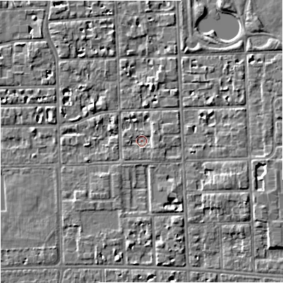 Shaded relief map of the ground around M168QS, computed from Environment Agency LiDAR. The ground here sits at about 29 m above sea level and falls 6 m across the surrounding 800 m. Surface water reaching this point runs off ground lying to the east-south-east, 1.3 m higher.