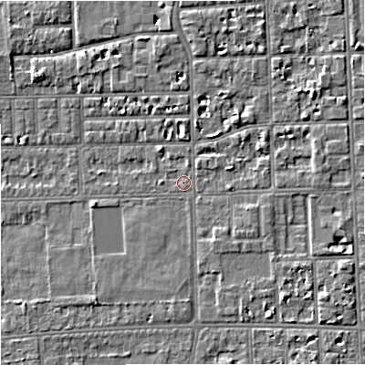 Shaded relief map of the ground around M168WJ, computed from Environment Agency LiDAR. The ground here sits at about 29 m above sea level and falls 5 m across the surrounding 800 m. Surface water reaching this point runs off ground lying to the south-east, 3.1 m higher.