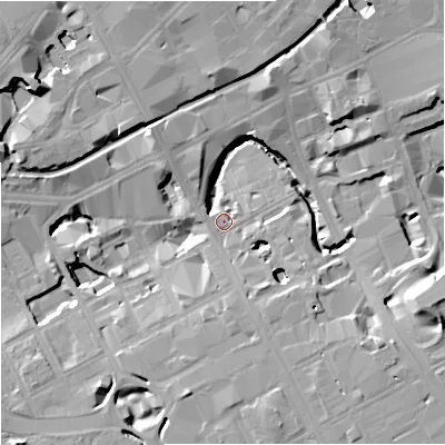 Shaded relief map of the ground around M16FZ, computed from Environment Agency LiDAR. The ground here sits at about 33 m above sea level and falls 16 m across the surrounding 800 m. Surface water reaching this point runs off ground lying to the east-south-east, 15.0 m higher.