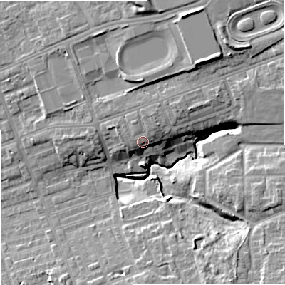 Shaded relief map of the ground around M187DJ, computed from Environment Agency LiDAR. The ground here sits at about 57 m above sea level and falls 16 m across the surrounding 800 m. Surface water reaching this point runs off ground lying to the north-north-west, 2.5 m higher.