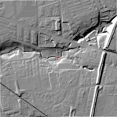 Shaded relief map of the ground around M187FF, computed from Environment Agency LiDAR. The ground here sits at about 58 m above sea level and falls 25 m across the surrounding 800 m. Surface water reaching this point runs off ground lying to the east-north-east, 22.5 m higher.