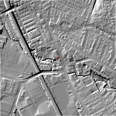 Shaded relief map of the ground around M192RA, computed from Environment Agency LiDAR. The ground here sits at about 58 m above sea level and falls 16 m across the surrounding 800 m. Surface water reaching this point runs off ground lying to the east-north-east, 2.5 m higher.