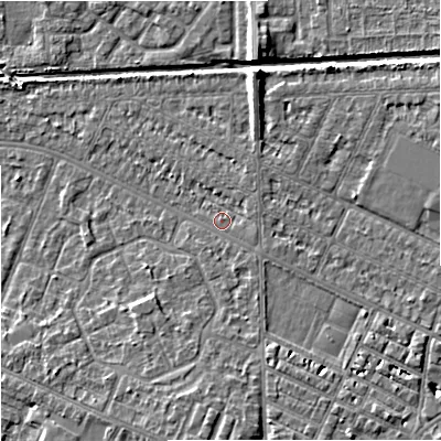 Shaded relief map of the ground around M201AB, computed from Environment Agency LiDAR. The ground here sits at about 34 m above sea level and falls 7 m across the surrounding 800 m. Surface water reaching this point runs off ground lying to the south, 3.3 m higher.