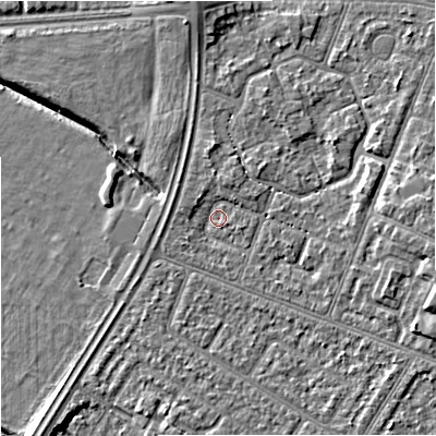 Shaded relief map of the ground around M201DR, computed from Environment Agency LiDAR. The ground here sits at about 31 m above sea level and falls 7 m across the surrounding 800 m. Surface water reaching this point runs off ground lying to the north, 3.4 m higher.