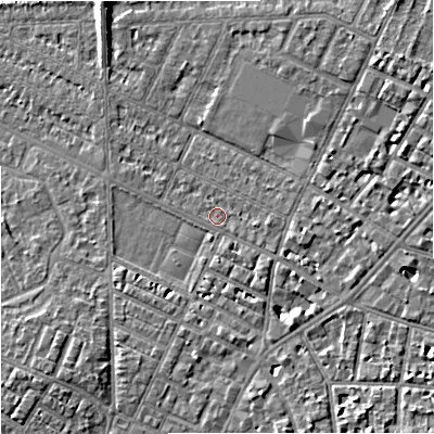 Shaded relief map of the ground around M203EG, computed from Environment Agency LiDAR. The ground here sits at about 34 m above sea level and falls 6 m across the surrounding 800 m. Surface water reaching this point runs off ground lying to the east, 1.2 m higher.