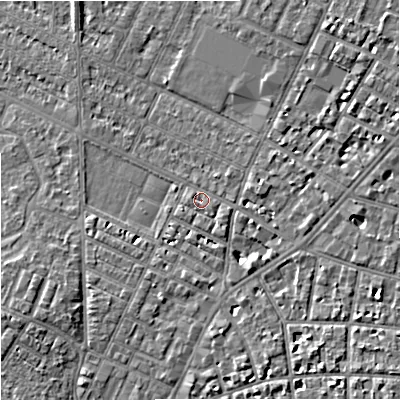 Shaded relief map of the ground around M203EQ, computed from Environment Agency LiDAR. The ground here sits at about 34 m above sea level and falls 6 m across the surrounding 800 m. Surface water reaching this point runs off ground lying to the south-east, 3.1 m higher.