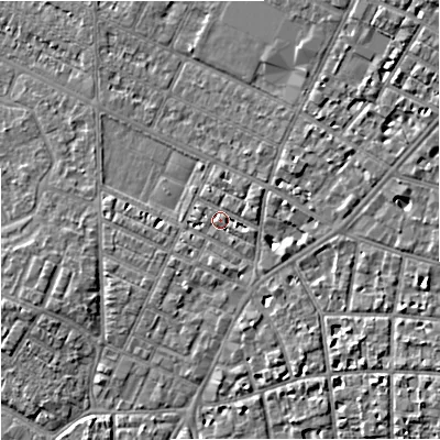 Shaded relief map of the ground around M203EU, computed from Environment Agency LiDAR. The ground here sits at about 35 m above sea level and falls 6 m across the surrounding 800 m. Surface water reaching this point runs off ground lying to the south-south-east, 1.5 m higher.