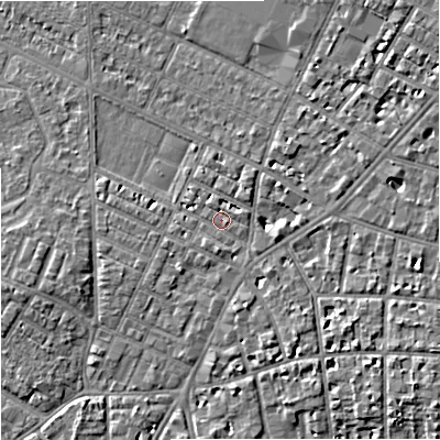 Shaded relief map of the ground around M203EX, computed from Environment Agency LiDAR. The ground here sits at about 35 m above sea level and falls 6 m across the surrounding 800 m. Surface water reaching this point runs off ground lying to the south-east, 4.4 m higher.