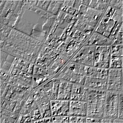 Shaded relief map of the ground around M203NA, computed from Environment Agency LiDAR. The ground here sits at about 36 m above sea level and falls 7 m across the surrounding 800 m. Surface water reaching this point runs off ground lying to the south-east, 1.1 m higher.