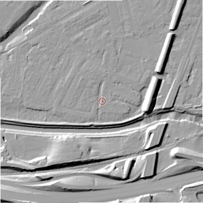 Shaded relief map of the ground around M205GB, computed from Environment Agency LiDAR. The ground here sits at about 33 m above sea level and falls 17 m across the surrounding 800 m. Surface water reaching this point runs off ground lying to the east-north-east, 1.9 m higher.