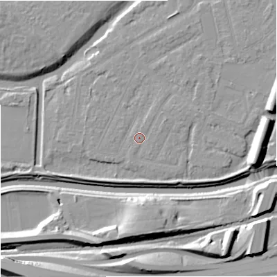 Shaded relief map of the ground around M205GD, computed from Environment Agency LiDAR. The ground here sits at about 33 m above sea level and falls 16 m across the surrounding 800 m. Surface water reaching this point runs off ground lying to the east, 1.9 m higher.