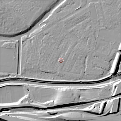 Shaded relief map of the ground around M205GE, computed from Environment Agency LiDAR. The ground here sits at about 33 m above sea level and falls 16 m across the surrounding 800 m. Surface water reaching this point runs off ground lying to the east, 1.9 m higher.