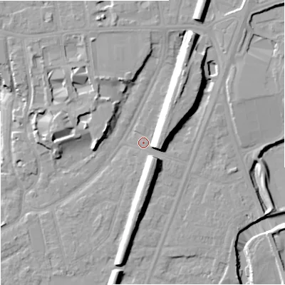 Shaded relief map of the ground around M205NF, computed from Environment Agency LiDAR. The ground here sits at about 34 m above sea level and falls 16 m across the surrounding 800 m. Surface water reaching this point runs off ground lying to the north-east, 9.0 m higher.