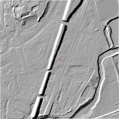Shaded relief map of the ground around M205NW, computed from Environment Agency LiDAR. The ground here sits at about 35 m above sea level and falls 15 m across the surrounding 800 m. Surface water reaching this point runs off ground lying to the west, 5.6 m higher.
