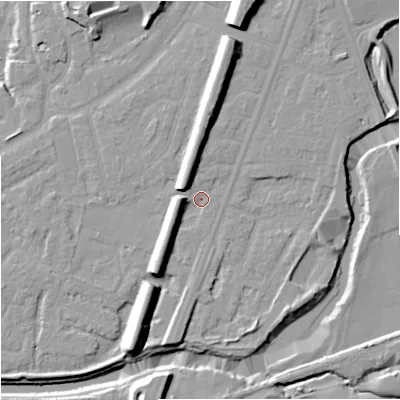 Shaded relief map of the ground around M205PS, computed from Environment Agency LiDAR. The ground here sits at about 34 m above sea level and falls 14 m across the surrounding 800 m. Surface water reaching this point runs off ground lying to the north-west, 6.8 m higher.