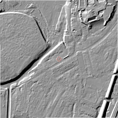 Shaded relief map of the ground around M205QA, computed from Environment Agency LiDAR. The ground here sits at about 33 m above sea level and falls 14 m across the surrounding 800 m. Surface water reaching this point runs off ground lying to the east-north-east, 1.8 m higher.