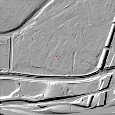 Shaded relief map of the ground around M205QE, computed from Environment Agency LiDAR. The ground here sits at about 33 m above sea level and falls 16 m across the surrounding 800 m. Surface water reaching this point runs off ground lying to the east, 1.9 m higher.
