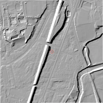 Shaded relief map of the ground around M205WJ, computed from Environment Agency LiDAR. The ground here sits at about 35 m above sea level and falls 14 m across the surrounding 800 m. Surface water reaching this point runs off ground lying to the west-north-west, 7.0 m higher.