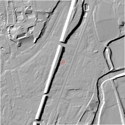 Shaded relief map of the ground around M205WN, computed from Environment Agency LiDAR. The ground here sits at about 35 m above sea level and falls 14 m across the surrounding 800 m. Surface water reaching this point runs off ground lying to the north, 7.4 m higher.