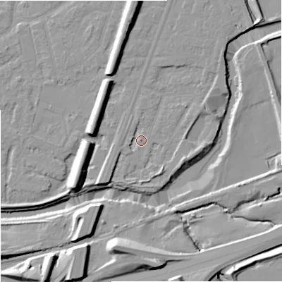 Shaded relief map of the ground around M205WT, computed from Environment Agency LiDAR. The ground here sits at about 34 m above sea level and falls 17 m across the surrounding 800 m. Surface water reaching this point runs off ground lying to the south-west, 3.4 m higher.