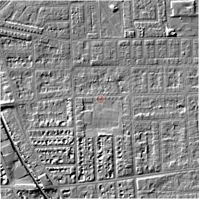 Shaded relief map of the ground around M210DZ, computed from Environment Agency LiDAR. The ground here sits at about 28 m above sea level and falls 6 m across the surrounding 800 m. Surface water reaching this point runs off ground lying to the south, 2.5 m higher.