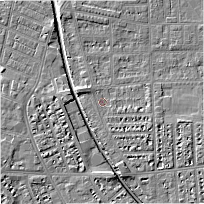 Shaded relief map of the ground around M210GT, computed from Environment Agency LiDAR. The ground here sits at about 28 m above sea level and falls 6 m across the surrounding 800 m. Surface water reaching this point runs off ground lying to the east-south-east, 2.6 m higher.