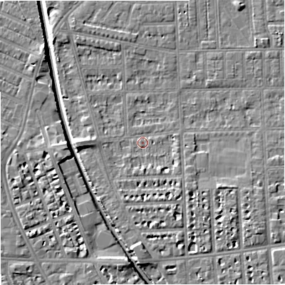 Shaded relief map of the ground around M210GU, computed from Environment Agency LiDAR. The ground here sits at about 28 m above sea level and falls 6 m across the surrounding 800 m. Surface water reaching this point runs off ground lying to the south-east, 2.4 m higher.