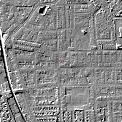Shaded relief map of the ground around M210GW, computed from Environment Agency LiDAR. The ground here sits at about 28 m above sea level and falls 7 m across the surrounding 800 m. Surface water reaching this point runs off ground lying to the north-north-east, 2.6 m higher.