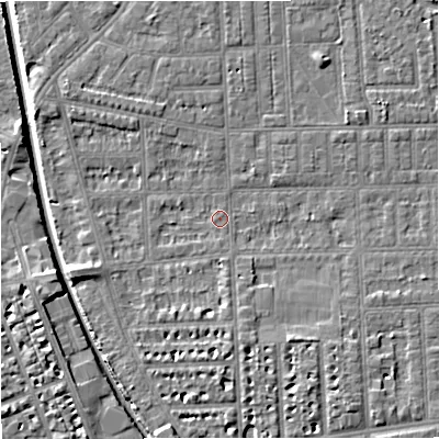 Shaded relief map of the ground around M210GX, computed from Environment Agency LiDAR. The ground here sits at about 28 m above sea level and falls 7 m across the surrounding 800 m. Surface water reaching this point runs off ground lying to the south-east, 3.3 m higher.