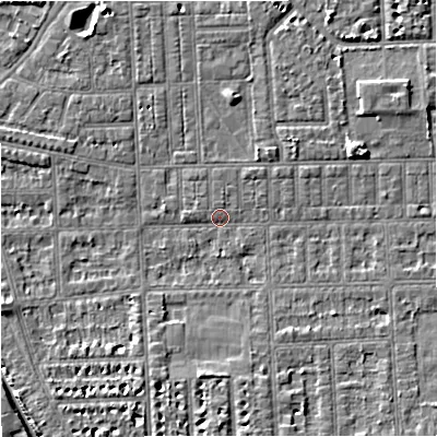 Shaded relief map of the ground around M210GZ, computed from Environment Agency LiDAR. The ground here sits at about 28 m above sea level and falls 6 m across the surrounding 800 m. Surface water reaching this point runs off ground lying to the north-east, 1.5 m higher.