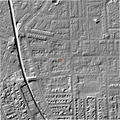 Shaded relief map of the ground around M210RB, computed from Environment Agency LiDAR. The ground here sits at about 28 m above sea level and falls 7 m across the surrounding 800 m. Surface water reaching this point runs off ground lying to the west-south-west, 3.6 m higher.