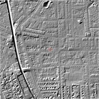 Shaded relief map of the ground around M210RD, computed from Environment Agency LiDAR. The ground here sits at about 28 m above sea level and falls 7 m across the surrounding 800 m. Surface water reaching this point runs off ground lying to the south-west, 3.6 m higher.