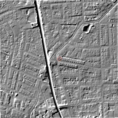 Shaded relief map of the ground around M210RP, computed from Environment Agency LiDAR. The ground here sits at about 29 m above sea level and falls 7 m across the surrounding 800 m. Surface water reaching this point runs off ground lying to the south-west, 1.0 m higher.