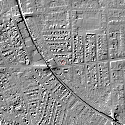 Shaded relief map of the ground around M210SD, computed from Environment Agency LiDAR. The ground here sits at about 28 m above sea level and falls 8 m across the surrounding 800 m. Surface water reaching this point runs off ground lying to the north-east, 2.4 m higher.