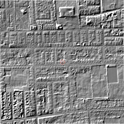Shaded relief map of the ground around M210TD, computed from Environment Agency LiDAR. The ground here sits at about 29 m above sea level and falls 4 m across the surrounding 800 m. Surface water reaching this point runs off ground lying to the north-north-east, 1.0 m higher.