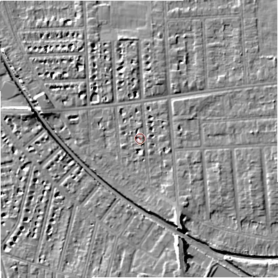 Shaded relief map of the ground around M210TF, computed from Environment Agency LiDAR. The ground here sits at about 29 m above sea level and falls 8 m across the surrounding 800 m. Surface water reaching this point runs off ground lying to the south-south-east, 4.1 m higher.