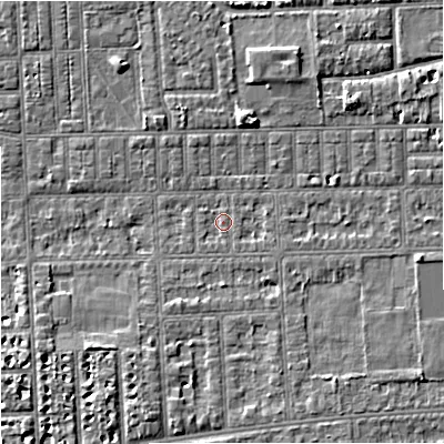 Shaded relief map of the ground around M210TG, computed from Environment Agency LiDAR. The ground here sits at about 29 m above sea level and falls 4 m across the surrounding 800 m. Surface water reaching this point runs off ground lying to the east-south-east, 0.9 m higher.