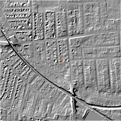 Shaded relief map of the ground around M210TH, computed from Environment Agency LiDAR. The ground here sits at about 29 m above sea level and falls 8 m across the surrounding 800 m. Surface water reaching this point runs off ground lying to the south-south-east, 4.1 m higher.