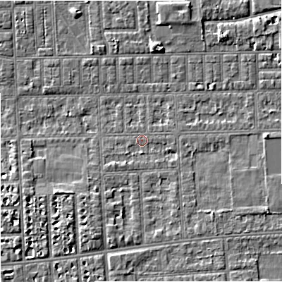 Shaded relief map of the ground around M210TP, computed from Environment Agency LiDAR. The ground here sits at about 29 m above sea level and falls 4 m across the surrounding 800 m. Surface water reaching this point runs off ground lying to the east, 2.5 m higher.