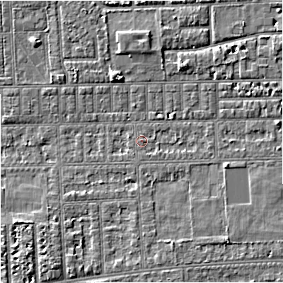 Shaded relief map of the ground around M210TR, computed from Environment Agency LiDAR. The ground here sits at about 29 m above sea level and falls 5 m across the surrounding 800 m. Surface water reaching this point runs off ground lying to the east, 1.1 m higher.