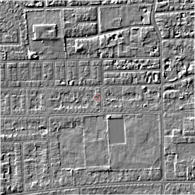 Shaded relief map of the ground around M210TZ, computed from Environment Agency LiDAR. The ground here sits at about 29 m above sea level and falls 5 m across the surrounding 800 m. Surface water reaching this point runs off ground lying to the east-south-east, 0.6 m higher.