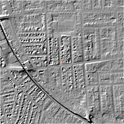 Shaded relief map of the ground around M210UH, computed from Environment Agency LiDAR. The ground here sits at about 29 m above sea level and falls 8 m across the surrounding 800 m. Surface water reaching this point runs off ground lying to the east-north-east, 3.0 m higher.
