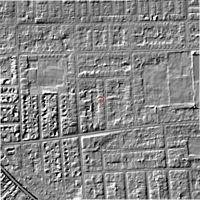 Shaded relief map of the ground around M210UP, computed from Environment Agency LiDAR. The ground here sits at about 29 m above sea level and falls 6 m across the surrounding 800 m. Surface water reaching this point runs off ground lying to the south, 1.5 m higher.