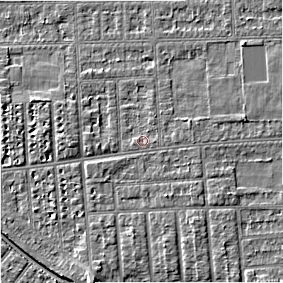 Shaded relief map of the ground around M210XA, computed from Environment Agency LiDAR. The ground here sits at about 29 m above sea level and falls 6 m across the surrounding 800 m. Surface water reaching this point runs off ground lying to the west-south-west, 0.8 m higher.