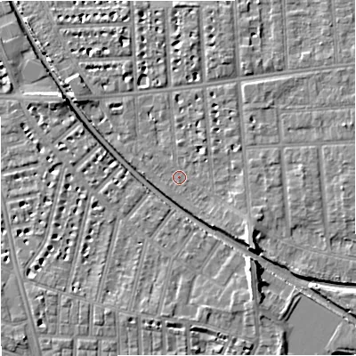 Shaded relief map of the ground around M210XD, computed from Environment Agency LiDAR. The ground here sits at about 29 m above sea level and falls 8 m across the surrounding 800 m. Surface water reaching this point runs off ground lying to the south-east, 4.6 m higher.