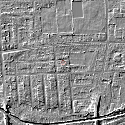 Shaded relief map of the ground around M210XU, computed from Environment Agency LiDAR. The ground here sits at about 30 m above sea level and falls 7 m across the surrounding 800 m. Surface water reaching this point runs off ground lying to the south-south-west, 0.8 m higher.