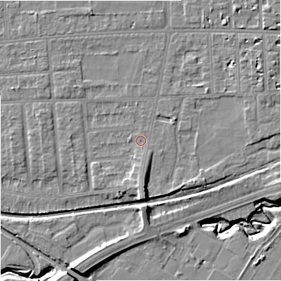 Shaded relief map of the ground around M210XZ, computed from Environment Agency LiDAR. The ground here sits at about 30 m above sea level and falls 11 m across the surrounding 800 m. Surface water reaching this point runs off ground lying to the south, 3.0 m higher.