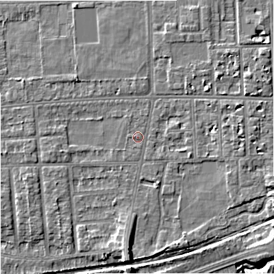 Shaded relief map of the ground around M210YB, computed from Environment Agency LiDAR. The ground here sits at about 30 m above sea level and falls 8 m across the surrounding 800 m. Surface water reaching this point runs off ground lying to the west-south-west, 0.6 m higher.