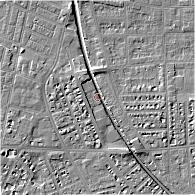 Shaded relief map of the ground around M211AZ, computed from Environment Agency LiDAR. The ground here sits at about 27 m above sea level and falls 7 m across the surrounding 800 m. Surface water reaching this point runs off ground lying to the south-south-east, 5.5 m higher.
